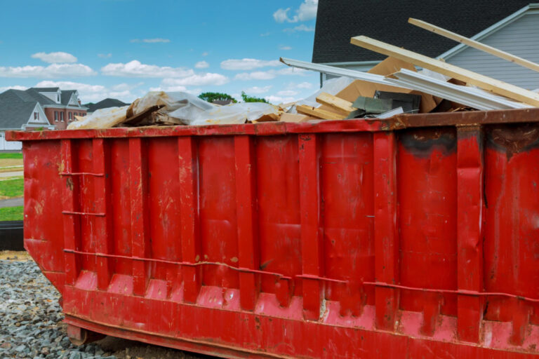 large red skip filled with rubbish